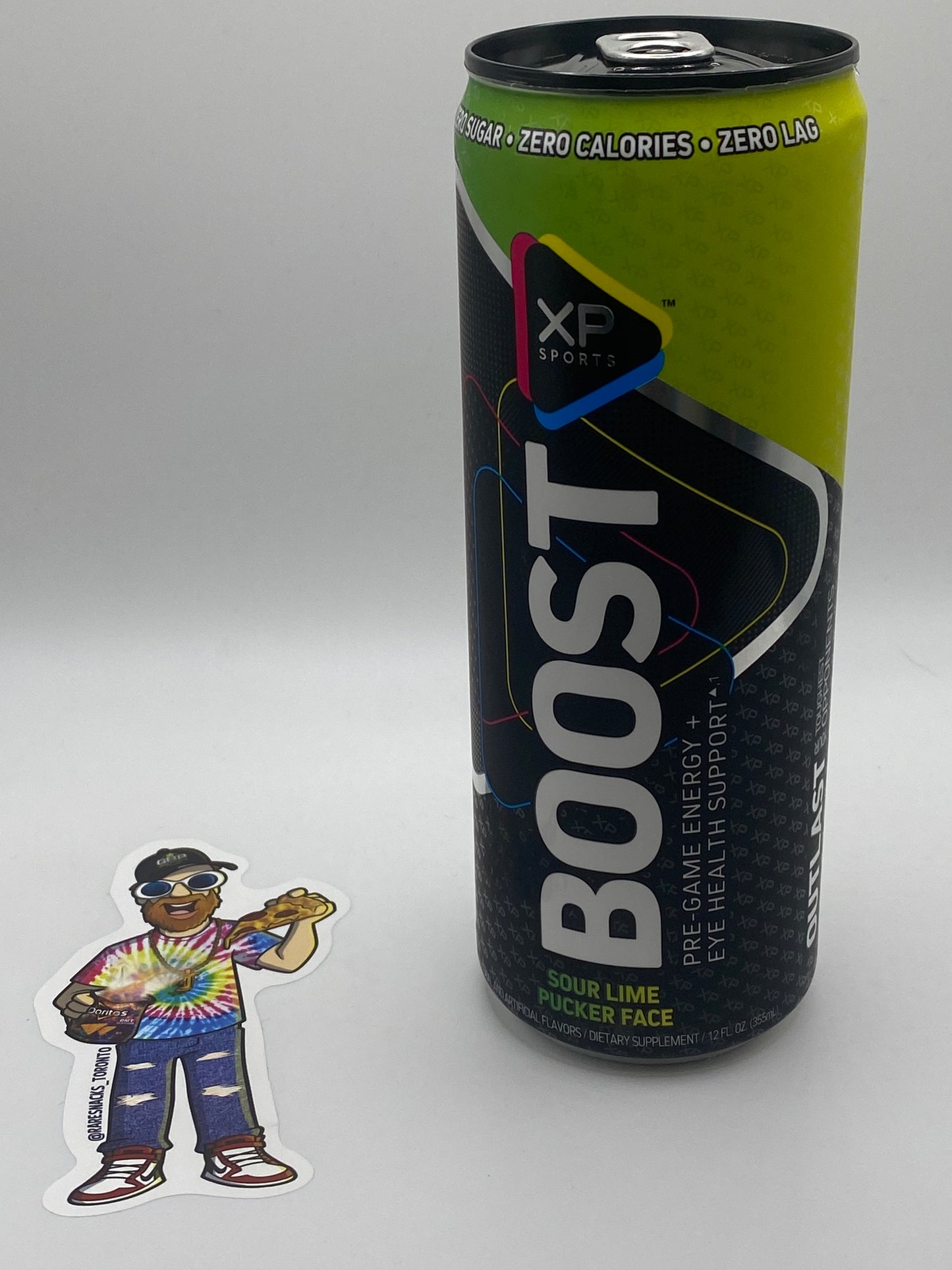 XP sports Boost Energy Drink Sour Lime Pucker Face